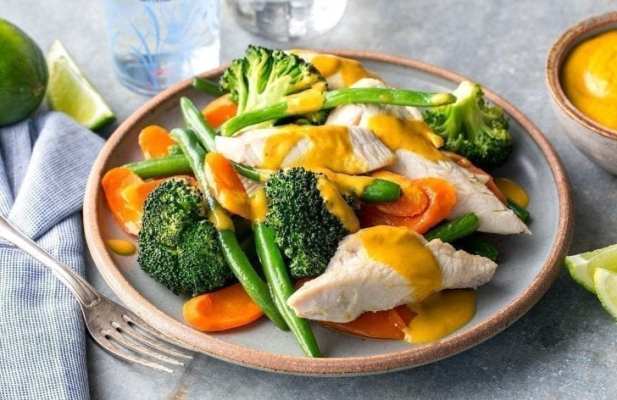 Poached Chicken With Steamed Veggies And Peanut Sauce - FoodWage recipe